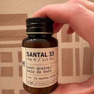 Le Labo Santal 33 Bath Grains in Brown Bottle